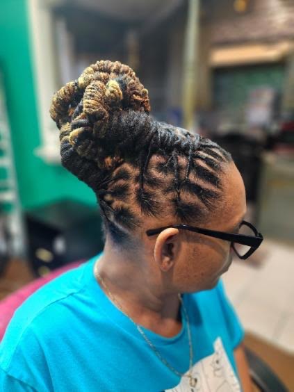 Women with locs styled