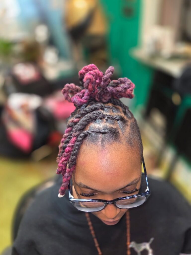Image of the Queen's Den Loc styling